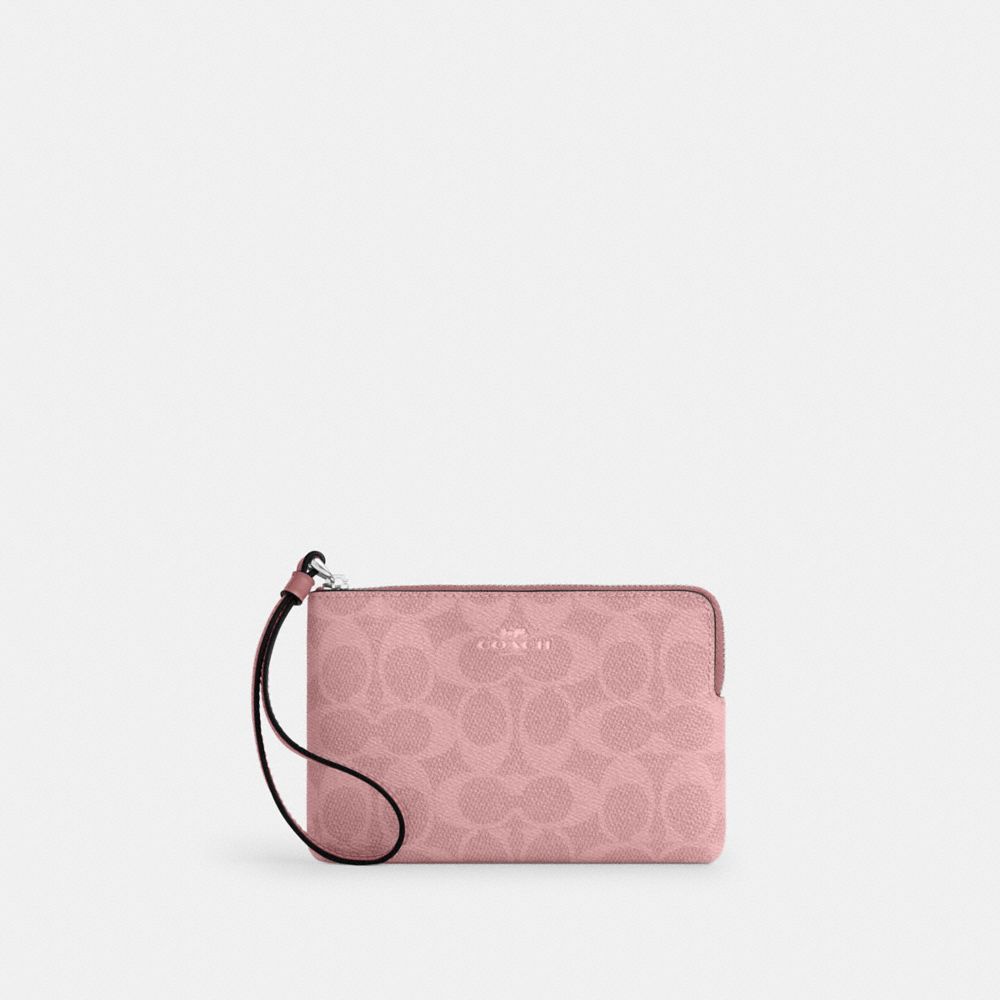 Coach Corner Zip Wristlet In Signature Canvas Sv Dusty Pink