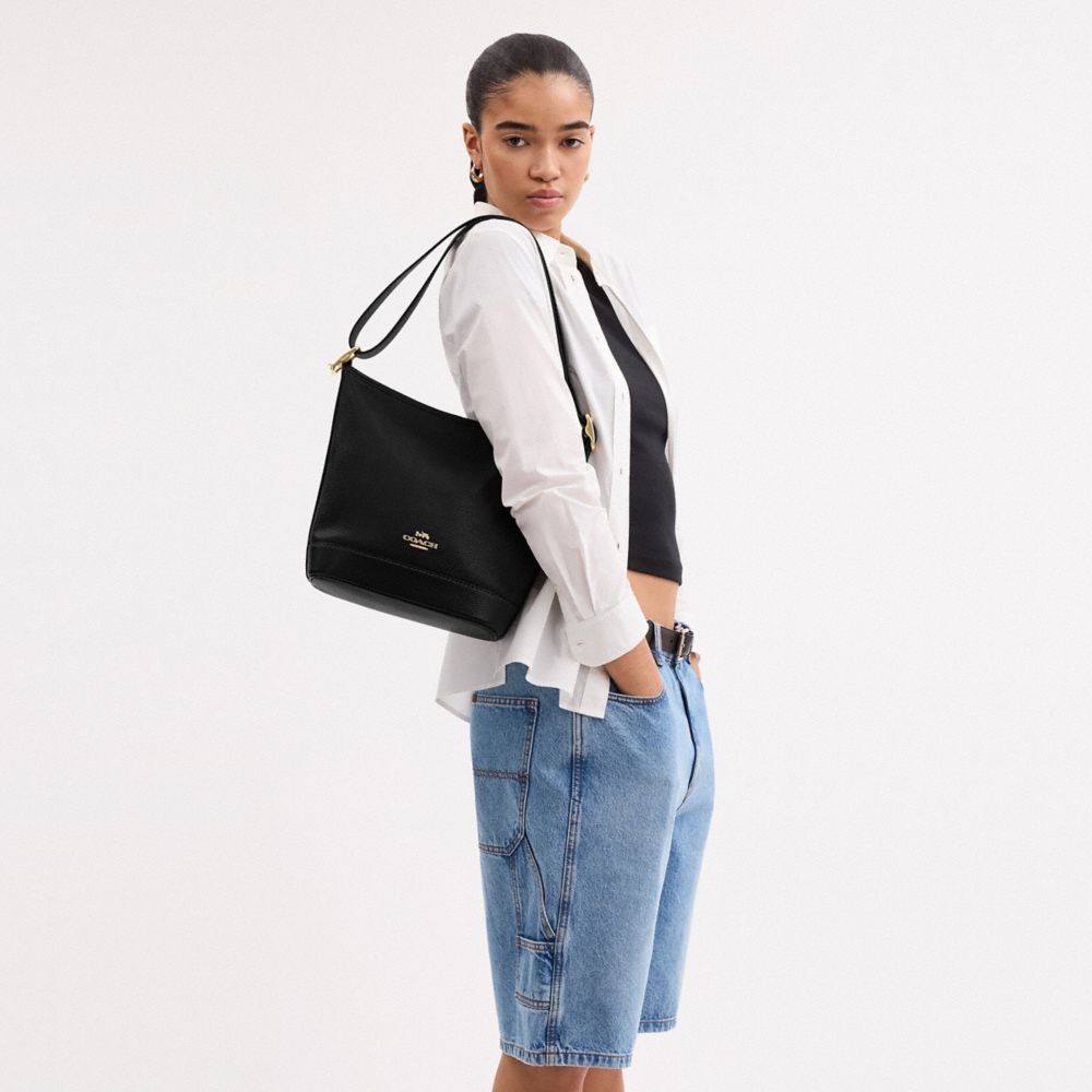Coach Jude Duffle Bag Gold Black
