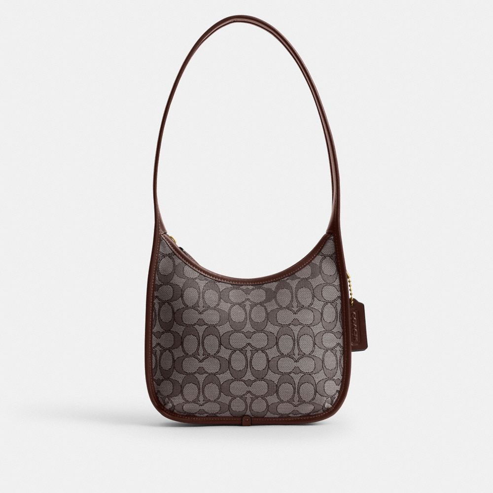 Coach Curve Zip Bag In Signature Jacquard Brass Oak Maple