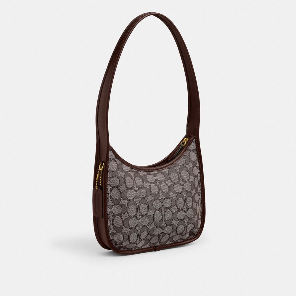 Coach Curve Zip Bag In Signature Jacquard Brass Oak Maple