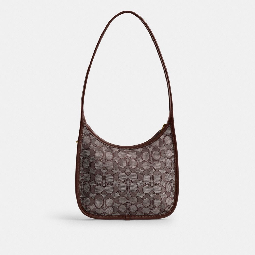 Coach Curve Zip Bag In Signature Jacquard Brass Oak Maple