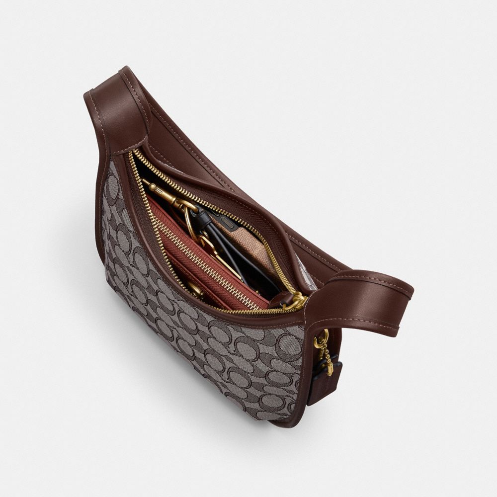 Coach Curve Zip Bag In Signature Jacquard Brass Oak Maple