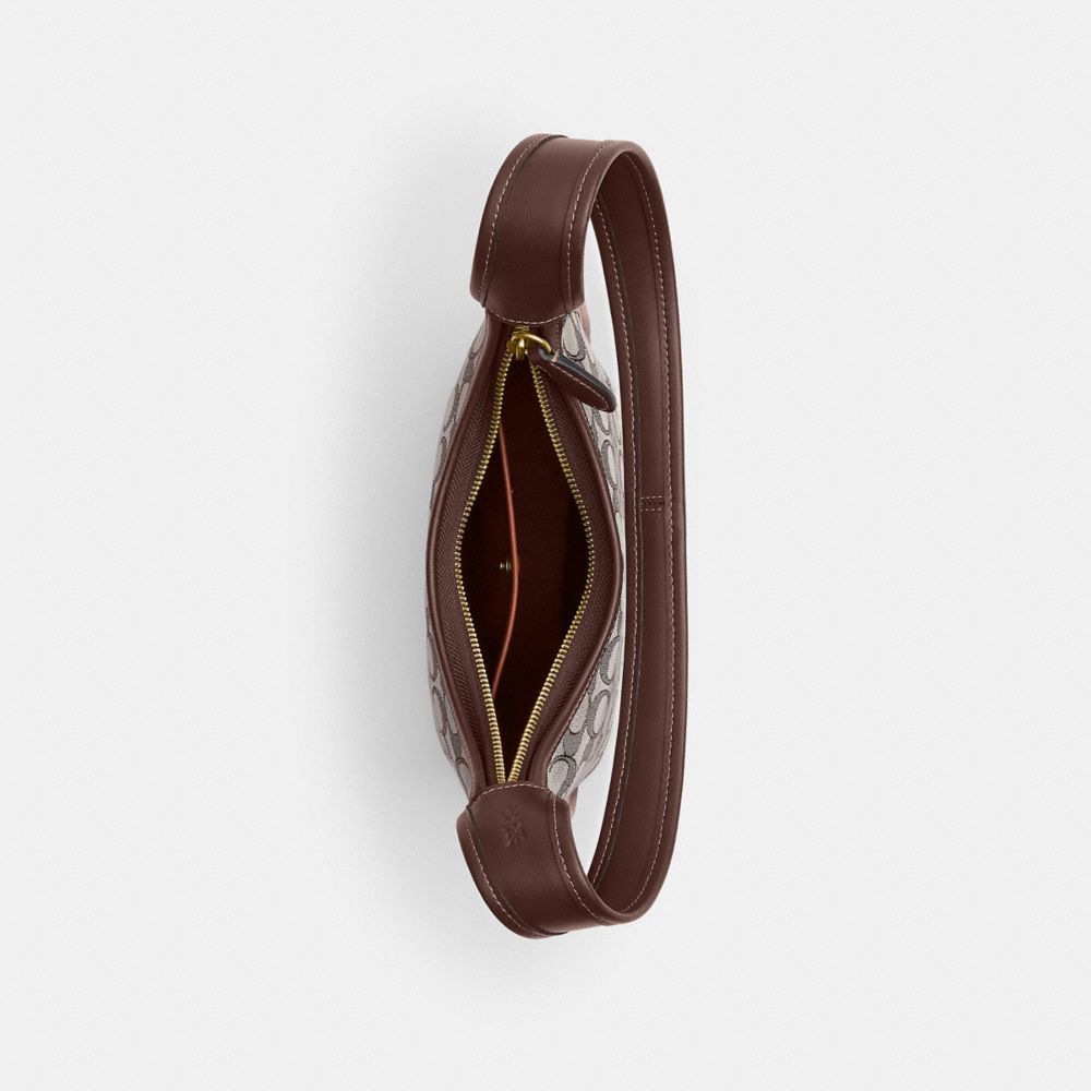 Coach Curve Zip Bag In Signature Jacquard Brass Oak Maple