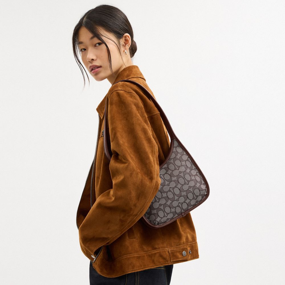 Coach Curve Zip Bag In Signature Jacquard Brass Oak Maple