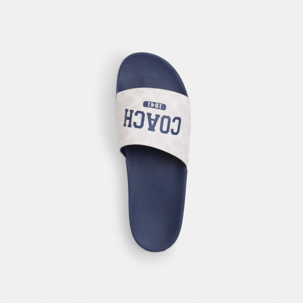 Coach Slide Sandal In Signature Canvas With Varsity Logo Deep Blue   Chalk