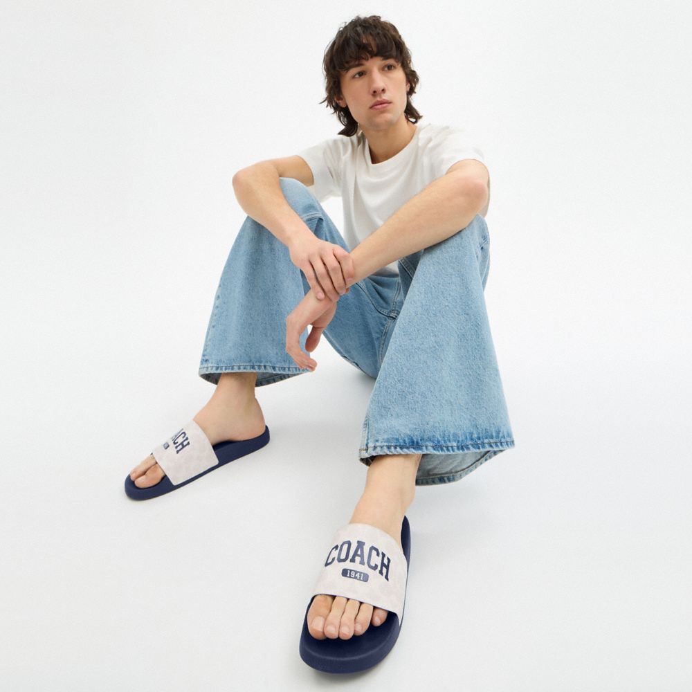 Coach Slide Sandal In Signature Canvas With Varsity Logo Deep Blue   Chalk