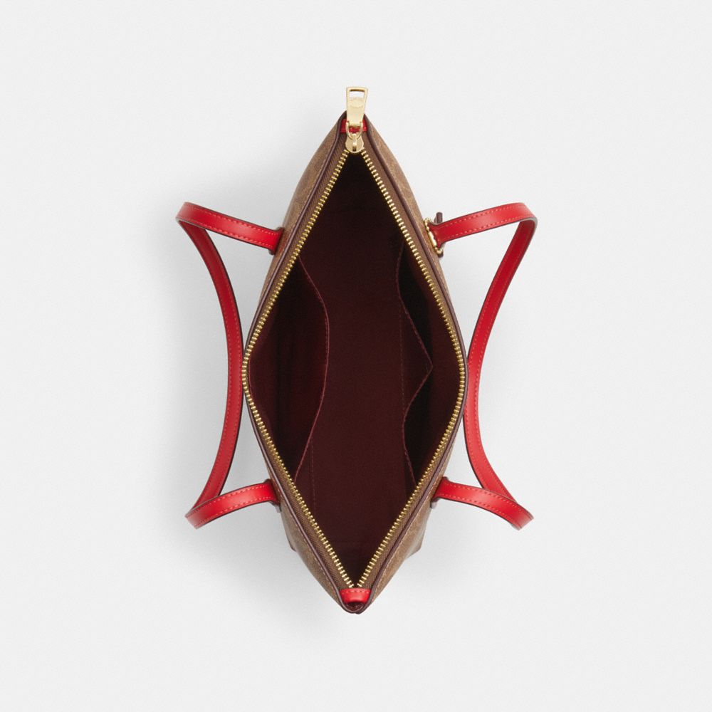 Coach Fiona Zip Tote Bag In Signature Canvas Gold Tan Carnation