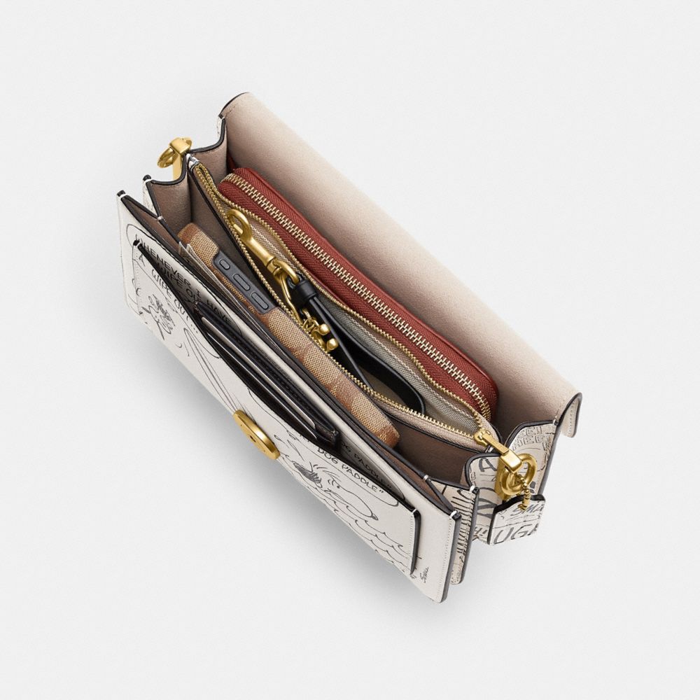 Coach Coach X Peanuts Tabby Shoulder Bag 26 With Newspaper Print Brass Chalk Multi