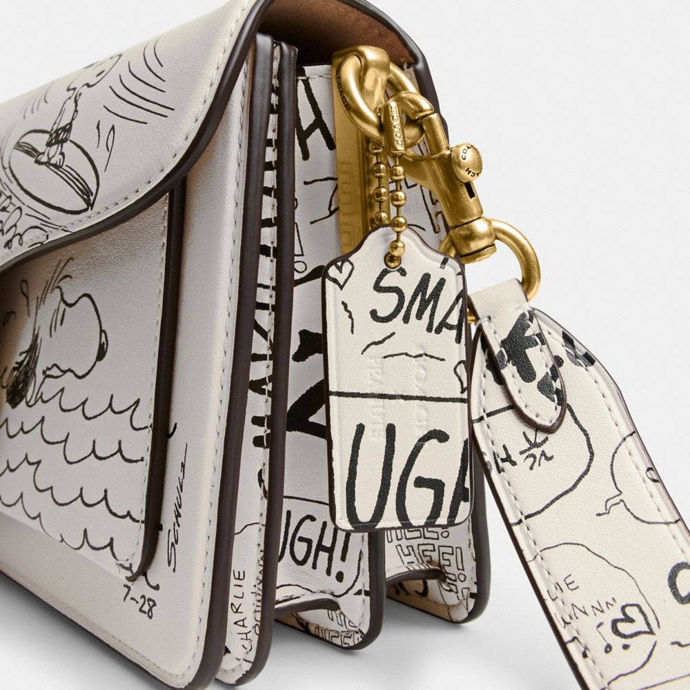 Coach Coach X Peanuts Tabby Shoulder Bag 26 With Newspaper Print Brass Chalk Multi