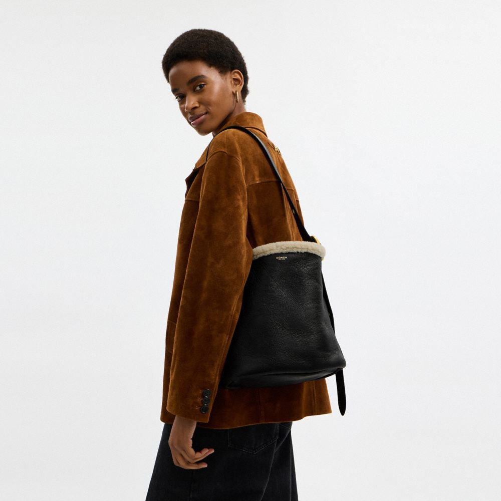 Coach Bleecker Bucket Bag In Shearling Brass Black Natural