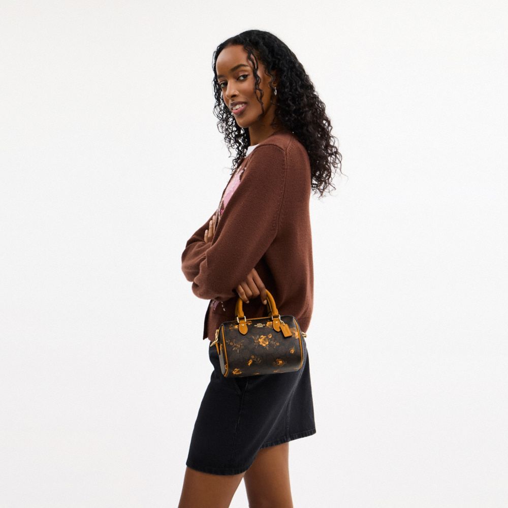 Coach Mini Rowan Crossbody Bag In Signature Canvas With Floral Print Im Walnut Yellow