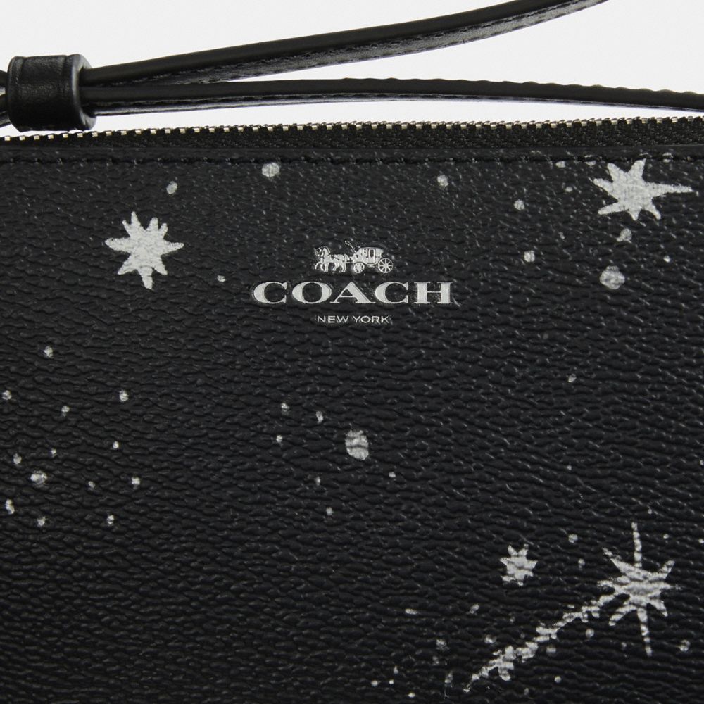 Coach Corner Zip Wristlet With Star Print Silver Black Multi
