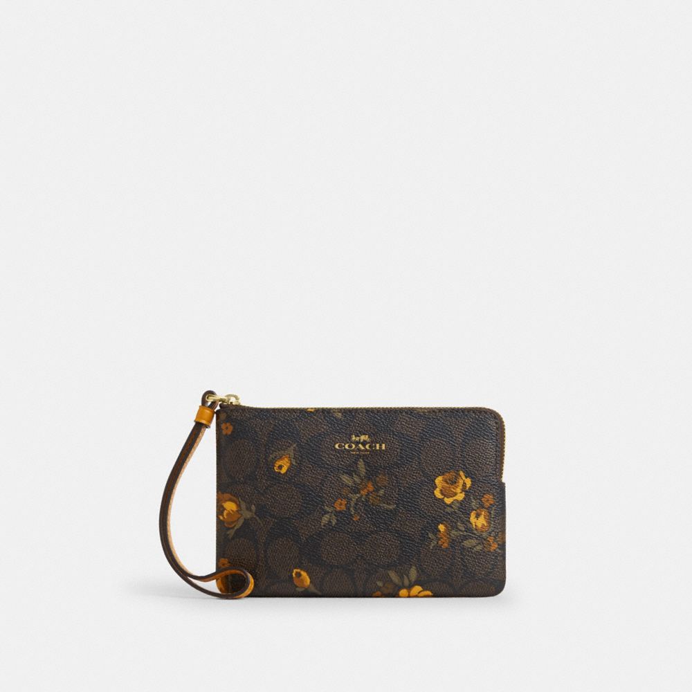 Coach Corner Zip Wristlet In Signature Canvas With Floral Print Im Walnut Yellow
