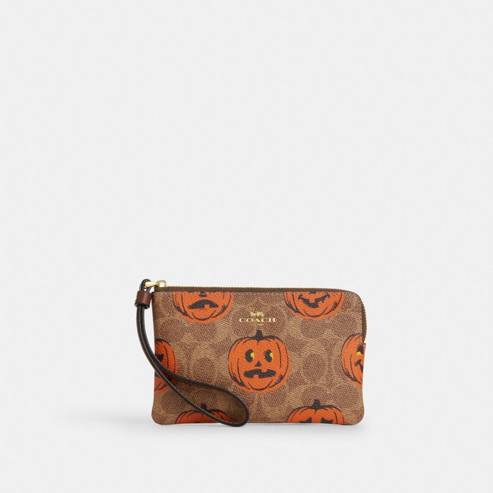 Coach Corner Zip Wristlet In Signature Canvas With Halloween Print Gold Tan Multi