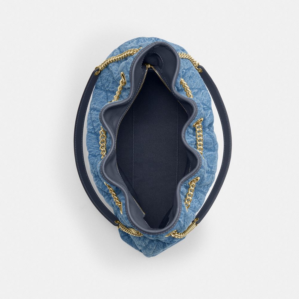 Coach Evelyn Shoulder Bag In Regenerative Cotton With Quilting Gold Indigo