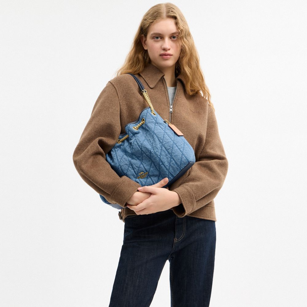 Coach Evelyn Shoulder Bag In Regenerative Cotton With Quilting Gold Indigo