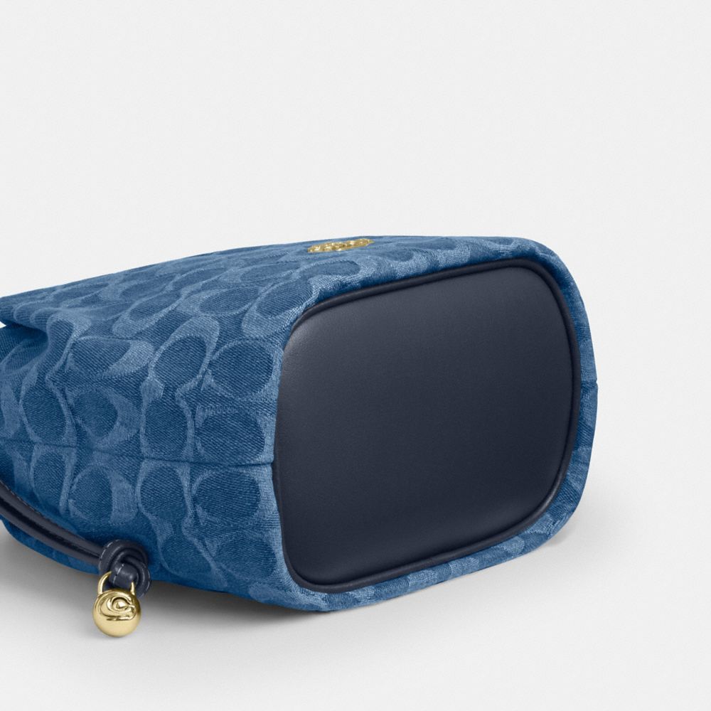 Coach Faye Mini Drawstring Bag In Signature Denim Gold Indigo