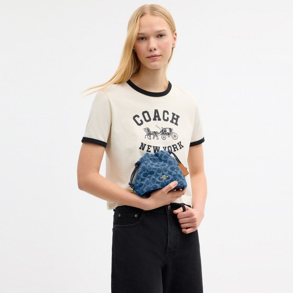 Coach Faye Mini Drawstring Bag In Signature Denim Gold Indigo