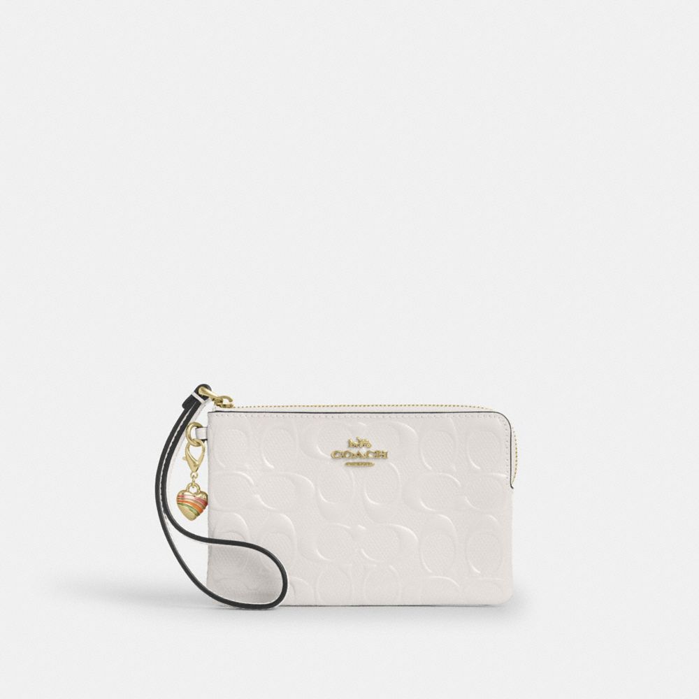 Coach Corner Zip Wristlet In Signature Leather With Heart Charm Gold Chalk