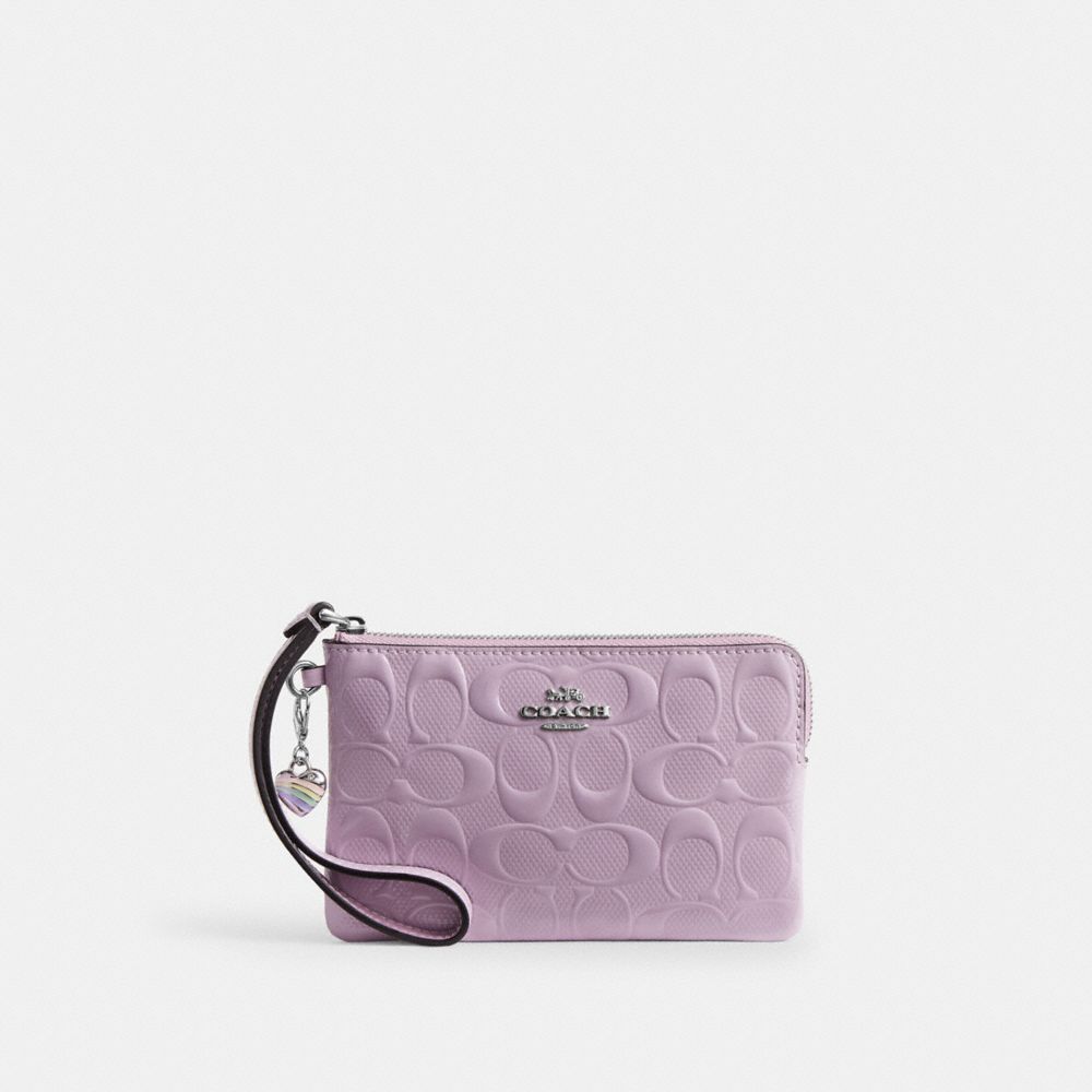 Coach Corner Zip Wristlet In Signature Leather With Heart Charm Silver Light Violet