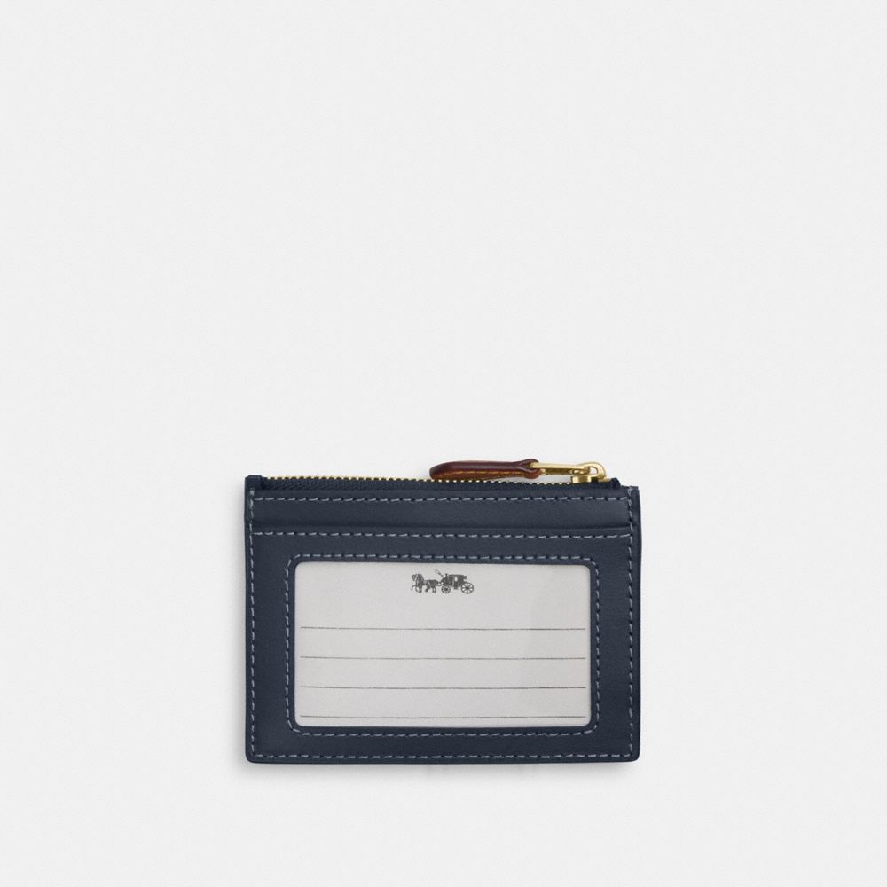 Coach Mini Skinny Id Case In Signature Denim Gold Indigo