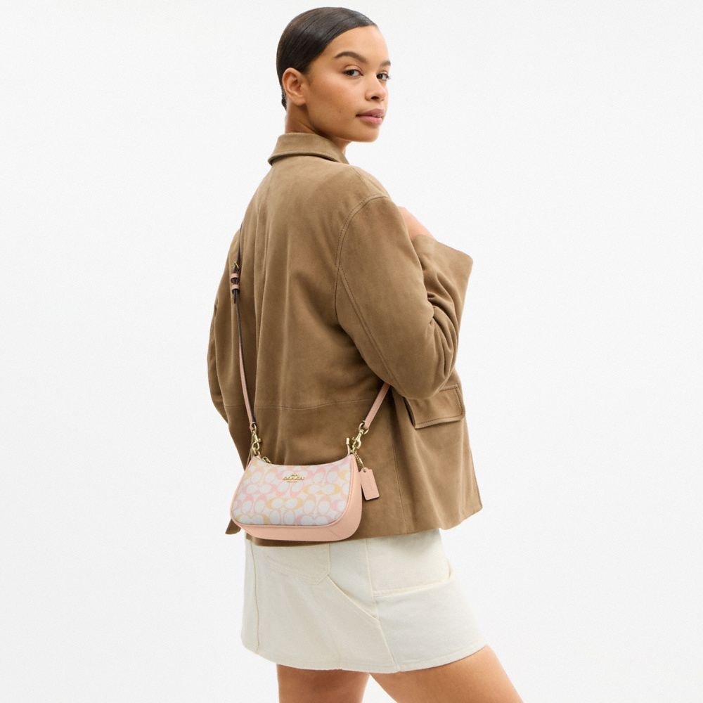 Coach Teri Mini Crossbody Bag In Signature Canvas Gold Chalk Pink
