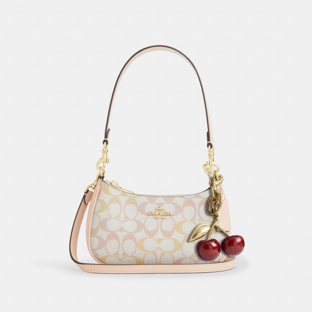 Coach Teri Mini Crossbody Bag In Signature Canvas Gold Chalk Pink