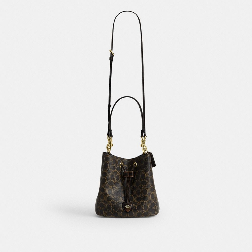 Coach Rowan Bucket Bag In Loved Signature Canvas With Charms Gold Brown