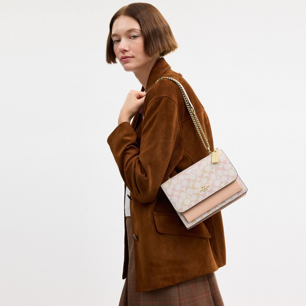 Coach Klare Crossbody Bag In Signature Canvas Gold Chalk Pink