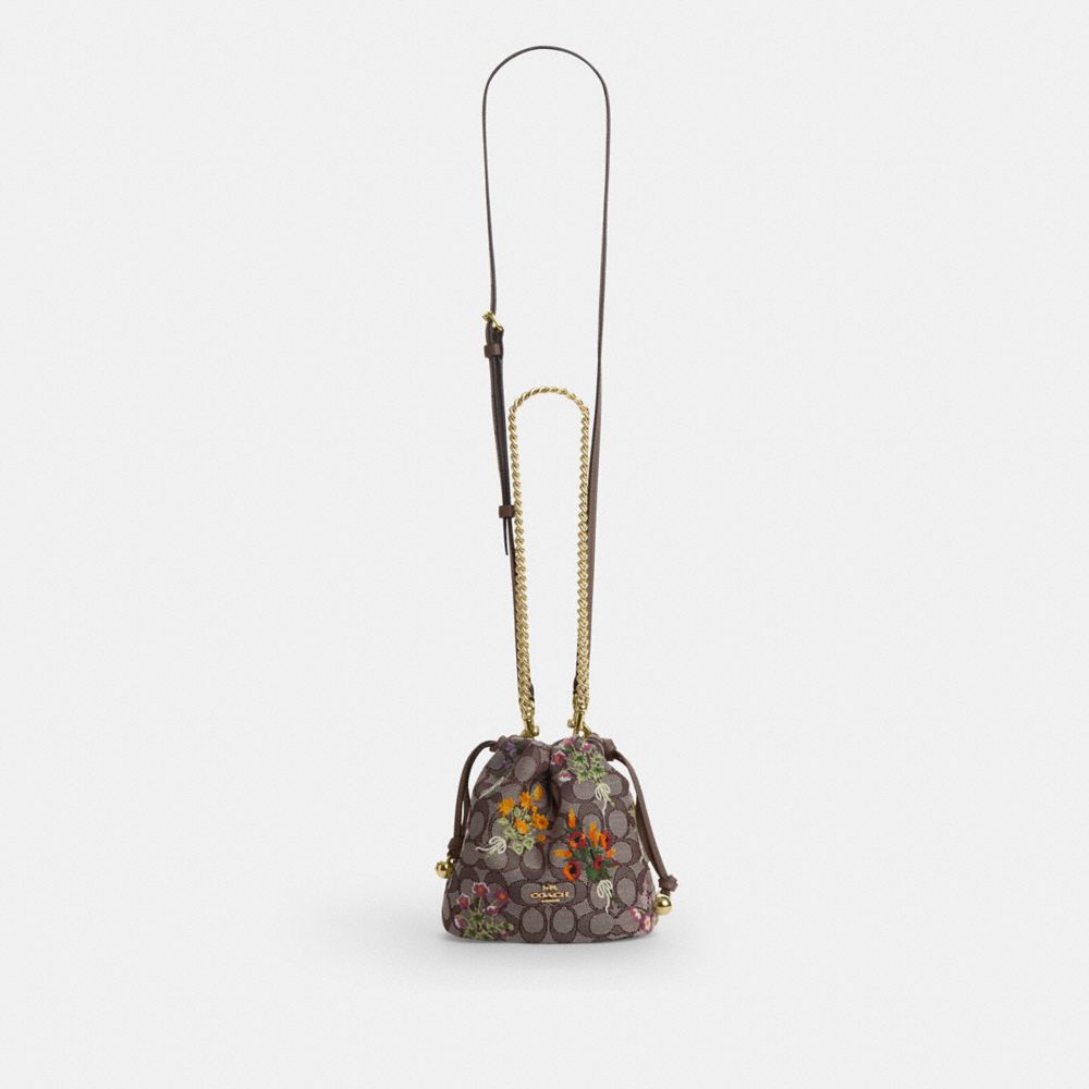 Coach Faye Mini Drawstring Bag In Signature Jacquard With Floral Embroidery Gold Oak Multi