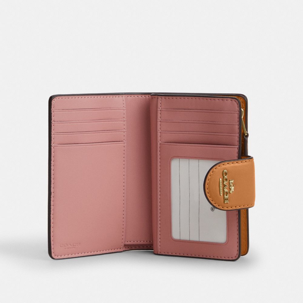 Coach Medium Corner Zip Wallet In Signature Canvas Gold Powder Pink