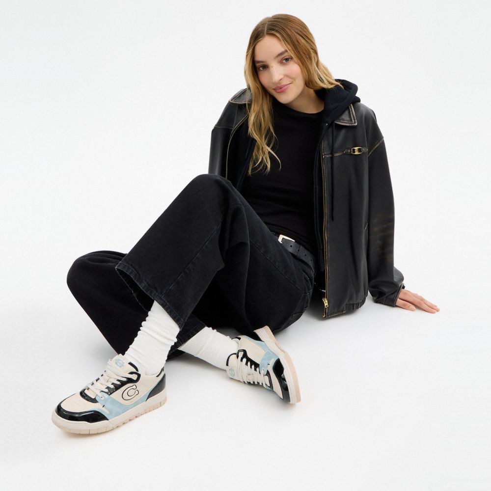 Women's Coach Soho Sneaker With Patent Signature Sea Mist Black.