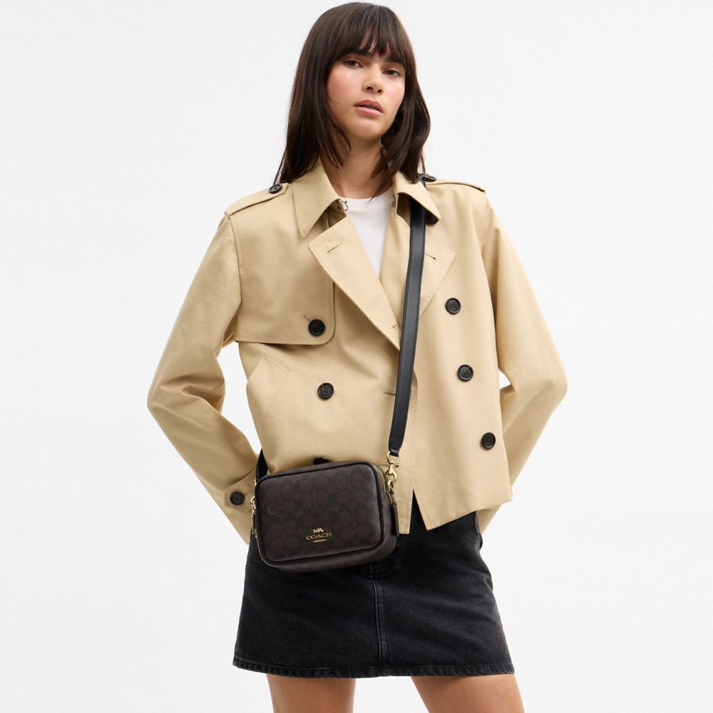 Coach Mini Carey Crossbody Bag In Signature Canvas Gold Walnut Black