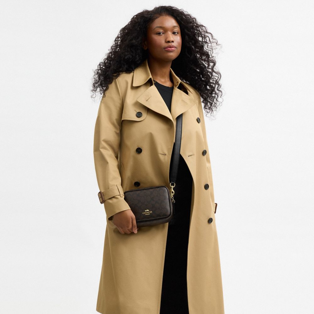 Coach Mini Carey Crossbody Bag In Signature Canvas Gold Walnut Black