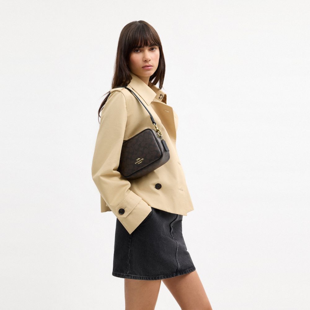 Coach Mini Carey Crossbody Bag In Signature Canvas Gold Walnut Black