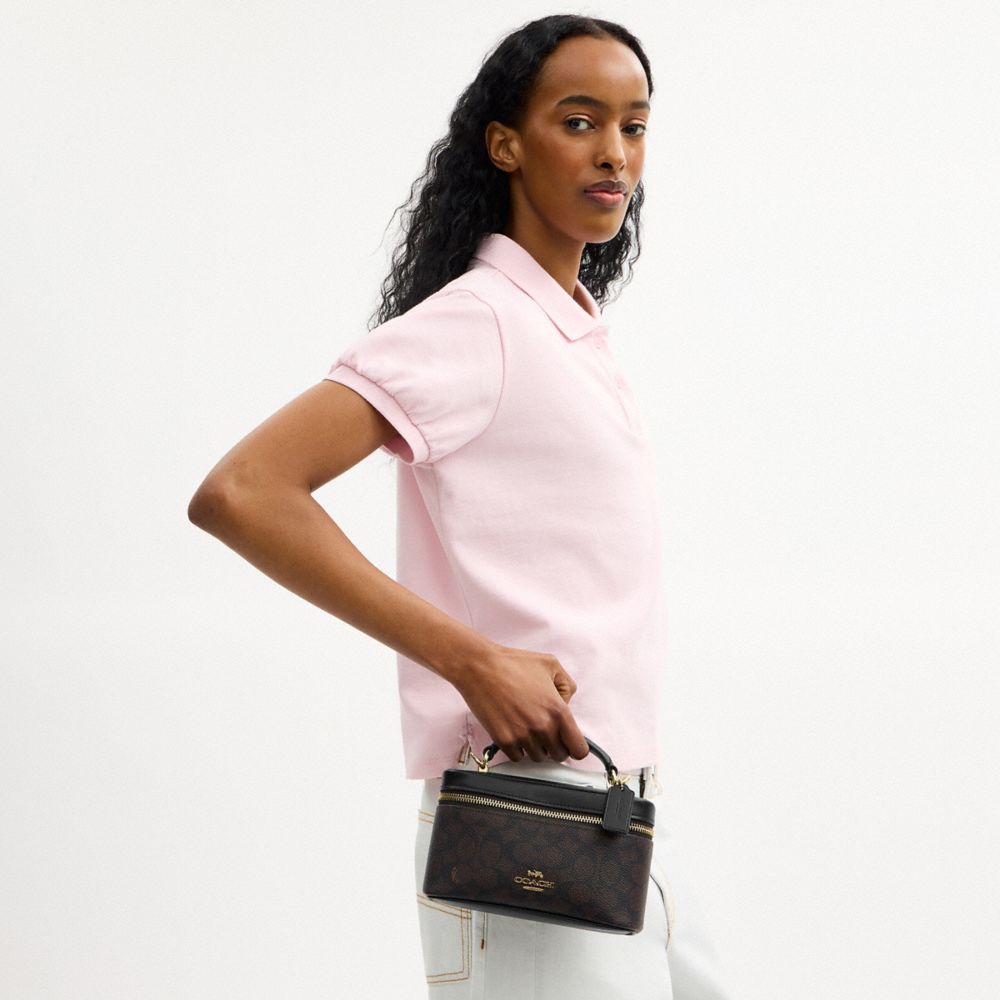 Coach Rainer Crossbody Bag 18 In Signature Canvas Gold Walnut Black