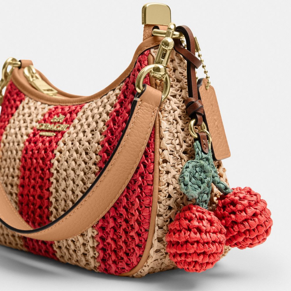 Coach Teri Shoulder Bag With Stripes And Charm Gold Red Tan