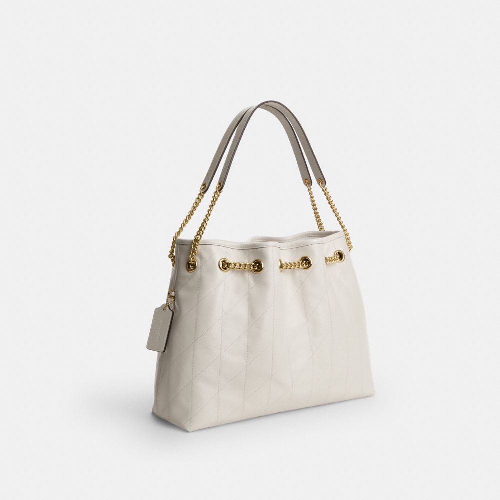 Coach Evelyn Shoulder Bag With Quilting And Charm Gold Chalk