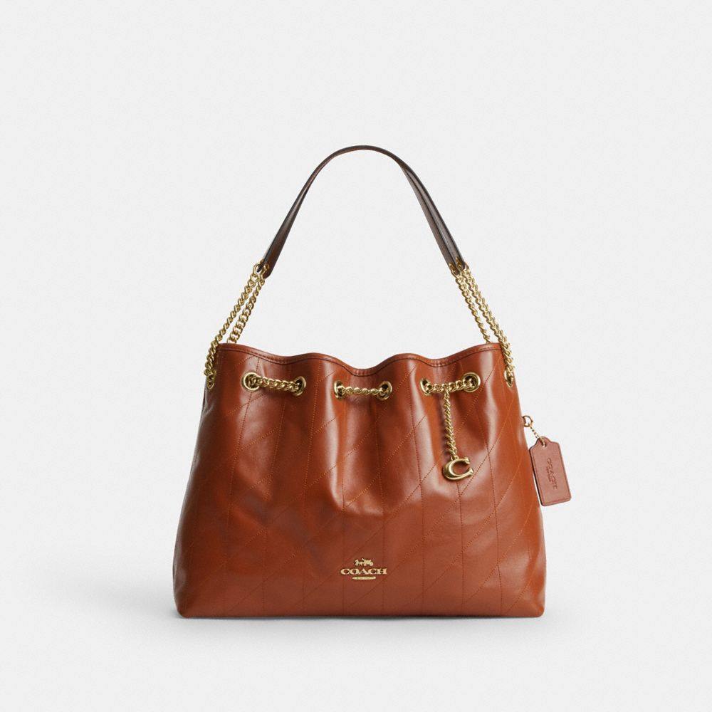 Coach Evelyn Shoulder Bag With Quilting And Charm Gold Cinnamon