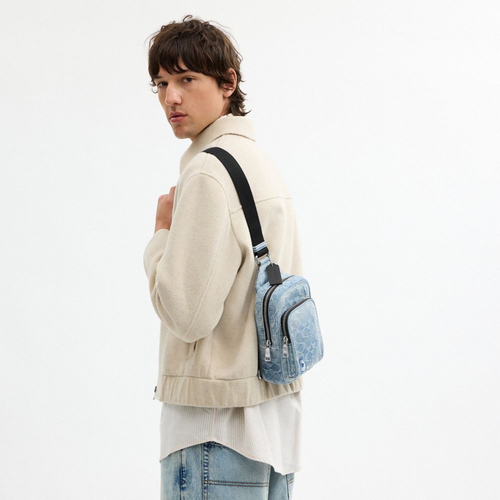 Coach Racer Sling Pack In Loved Signature Denim Silver Light Indigo