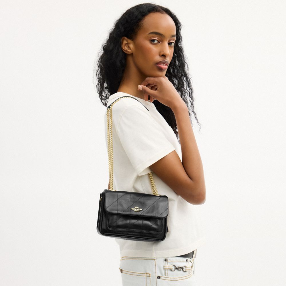 Coach Elodie Crossbody Bag 18 With Quilting Gold Black