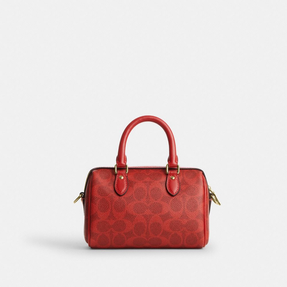 Coach Mini Rowan Crossbody Bag In Signature Canvas Gold Crimson