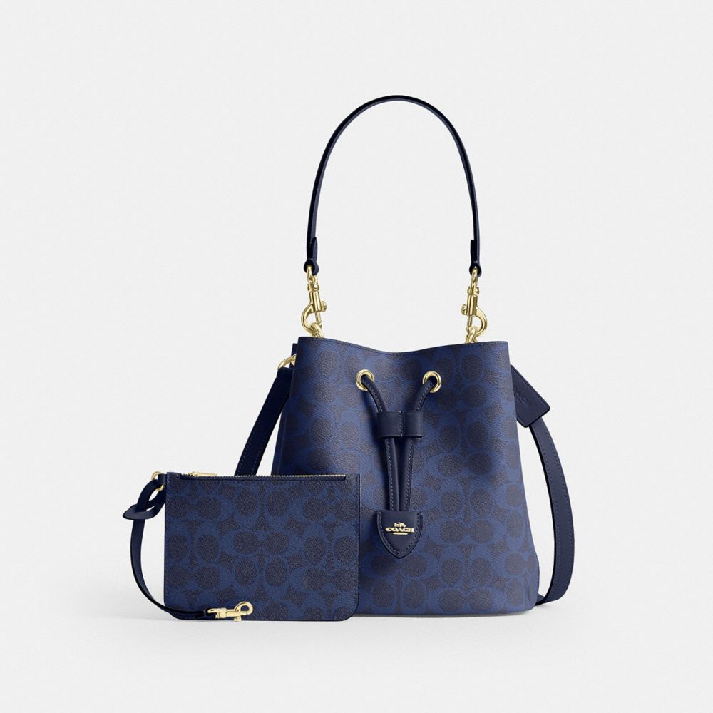Coach Rowan Bucket Bag In Signature Canvas Gold/Navy