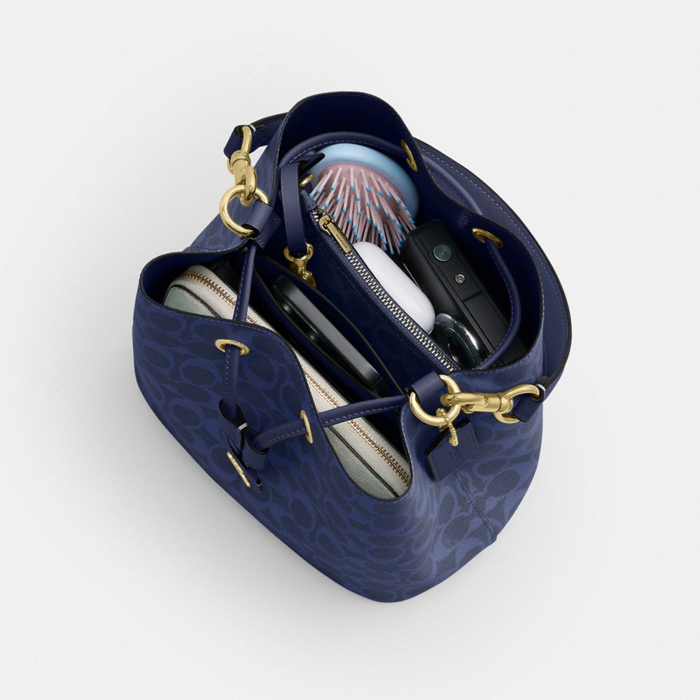 Coach Rowan Bucket Bag In Signature Canvas Gold/Navy