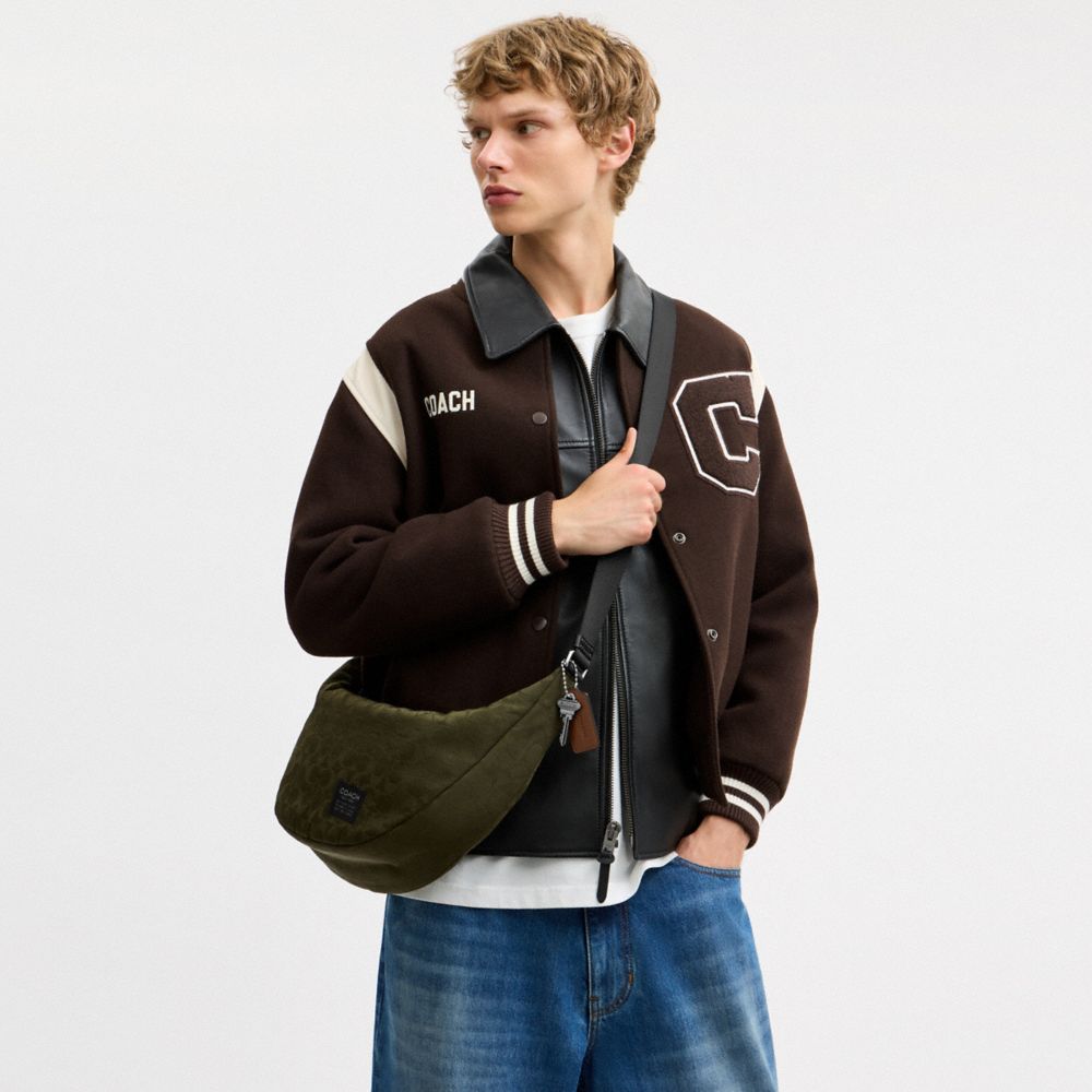 Coach Leon Sling Bag In Signature Nylon Jacquard Dark Moss