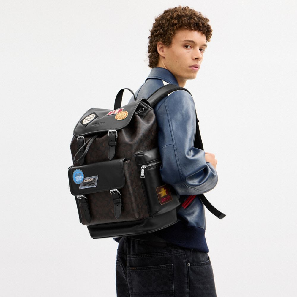 Coach Sprint Backpack In Signature Canvas With Patches Sv/Walnut/Black