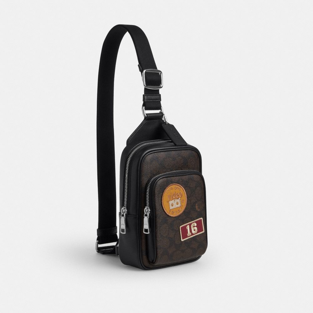 Coach Racer Sling Pack In Signature Canvas With Patches Sv/Walnut/Black