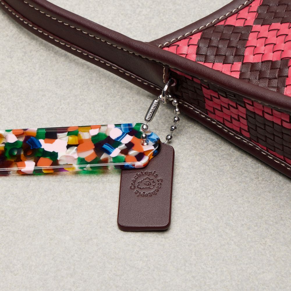 Coach Ergo Bag With Woven Checkerboard In Repurposed Leather Oxblood Strawberry Haze