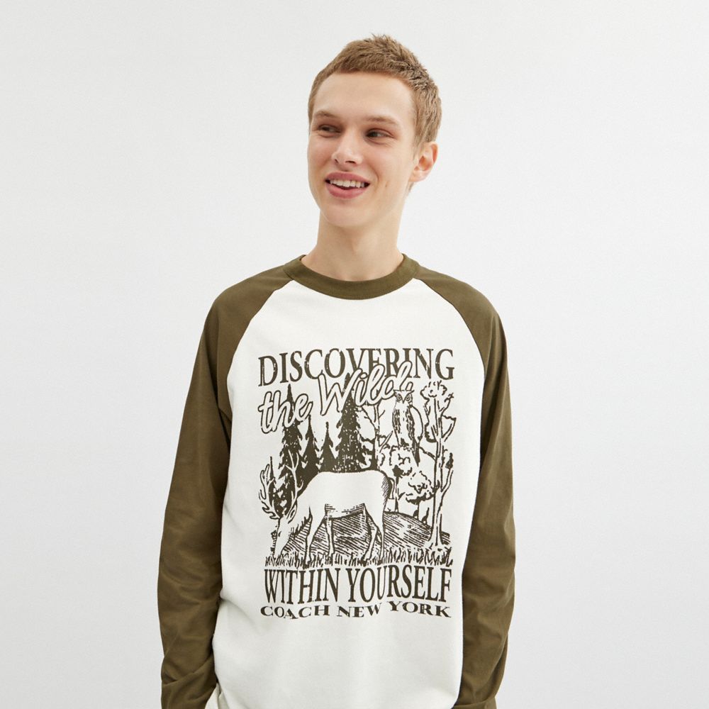 Coach Wild Raglan Crewneck Long Sleeve T Shirt In Organic Cotton Cream Multicolor