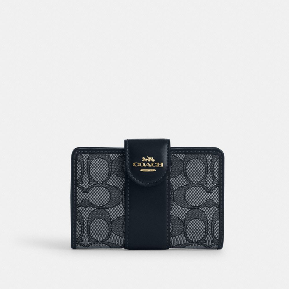 Coach Medium Corner Zip Wallet In Signature Jacquard Gold Navy Midnight Navy